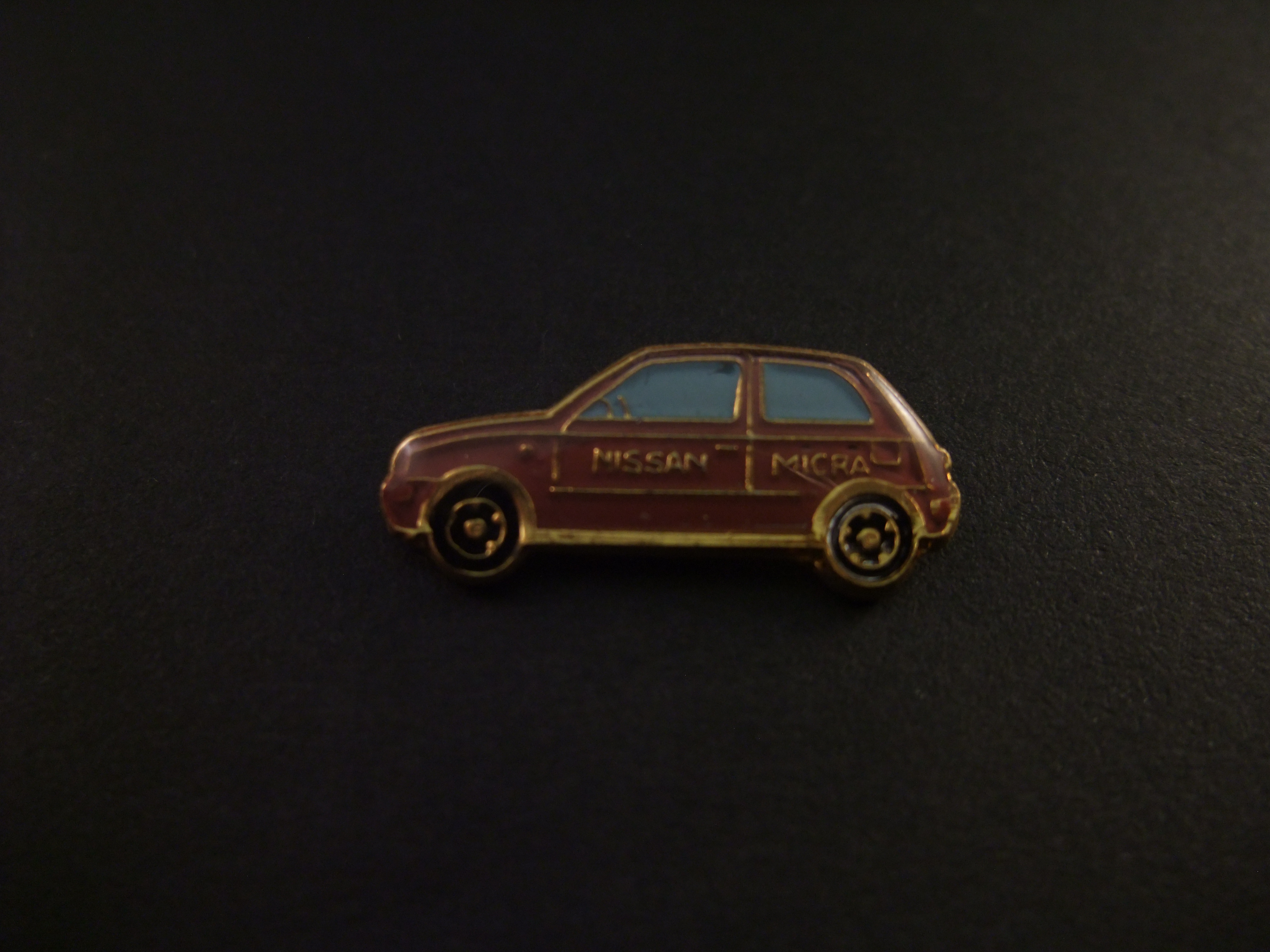 Nissan Micra paars model